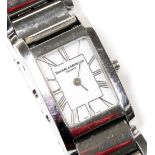 A Baume & Mercier lady's stainless steel cased wristwatch, rectangular white dial bearing Roman nume