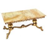 A gilt metal coffee table, the rectangular green onyx top with a moulded edge above a pierced frieze