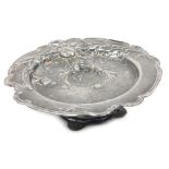 A WMF Art Nouveau pewter footed dish, embossed with flowers, 18cm wide.