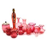 A group of 19thC and later cranberry coloured glass, to include a biscuit barrel with silver plated