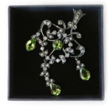 An Edwardian chandelier style pendant, set with seed pearls, diamonds and peridot, mixture of round