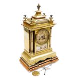 A late 19thC Continental brass mantel clock, circular silvered dial, painted with Roman ruins in the