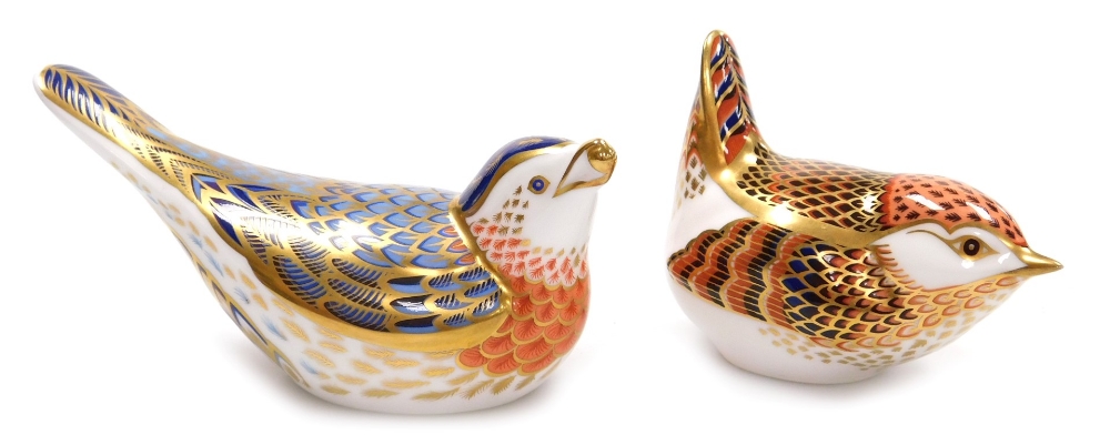 Two Royal Crown Derby porcelain bird paperweights, comprising Bluebird, red printed marks and gold s