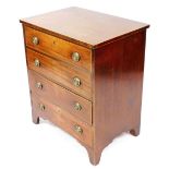 An early 19thC mahogany and boxwood strung small chest of four drawers, with brass drop handles and