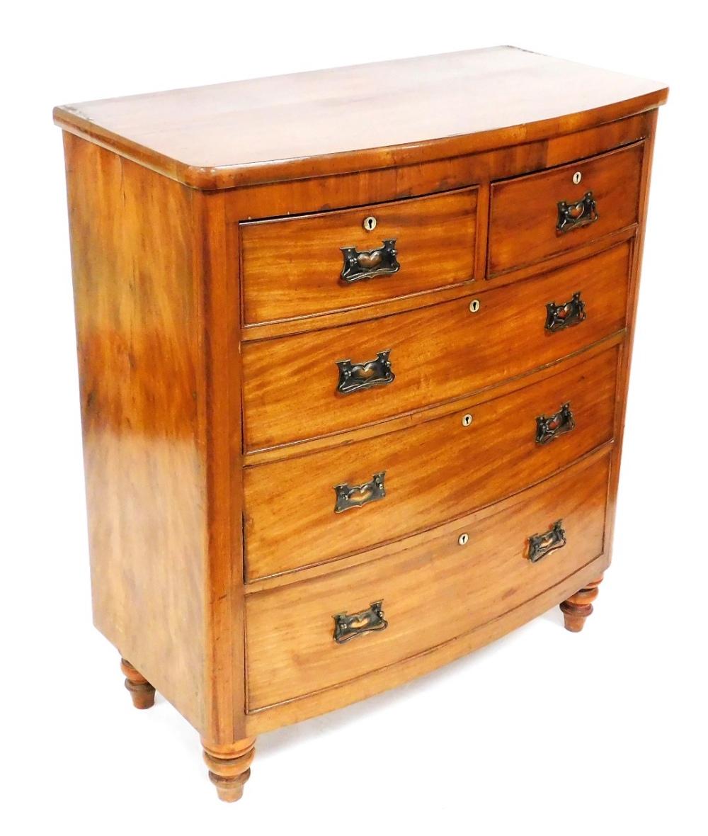 A Victorian mahogany bow fronted chest, with two short over three long drawers, with mother of pearl