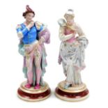 A pair of late 19thC Continental porcelain figures, modelled as a male and female in sixteenth centu