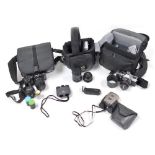 A group of camera related equipment, to include a Praktica MTL 5 camera, Pentax 8x21 binoculars 2940