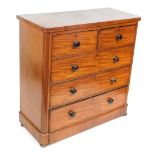A Victorian mahogany chest, of two short over three long drawers, with turned knop handles, on a pli