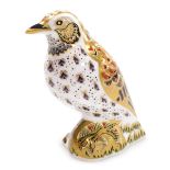 A Royal Crown Derby porcelain Song Thrush paperweight, red printed marks and gold stopper, 12cm high