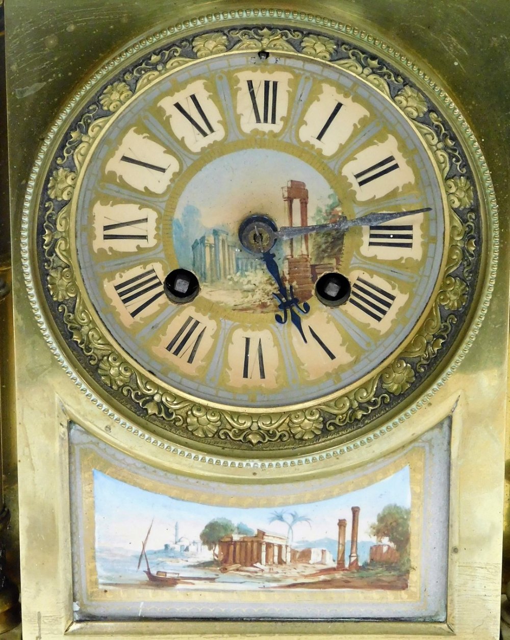 A late 19thC Continental brass mantel clock, circular silvered dial, painted with Roman ruins in the - Image 2 of 3