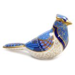 A Royal Crown Derby porcelain Blue Jay paperweight, red printed marks and gold stopper, 16cm wide.