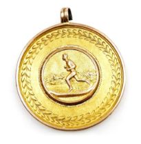 An Edward VII 9ct gold sporting medallion, engraved '120 and 440 Foot Handicap First Prize, Won by A