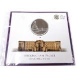 A Royal Mint 2015 United Kingdom £100 fine silver coin, depicting Buckingham Palace.