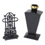 A Victorian cast iron umbrella stand, 51cm high, together with a further black painted umbrella stan