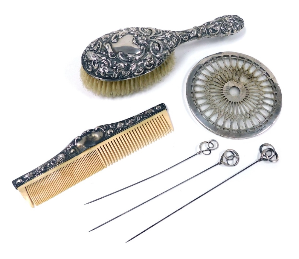 A group of small silver, to include three hat pins, a Victorian silver mounted hairbrush and comb, w