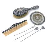 A group of small silver, to include three hat pins, a Victorian silver mounted hairbrush and comb, w