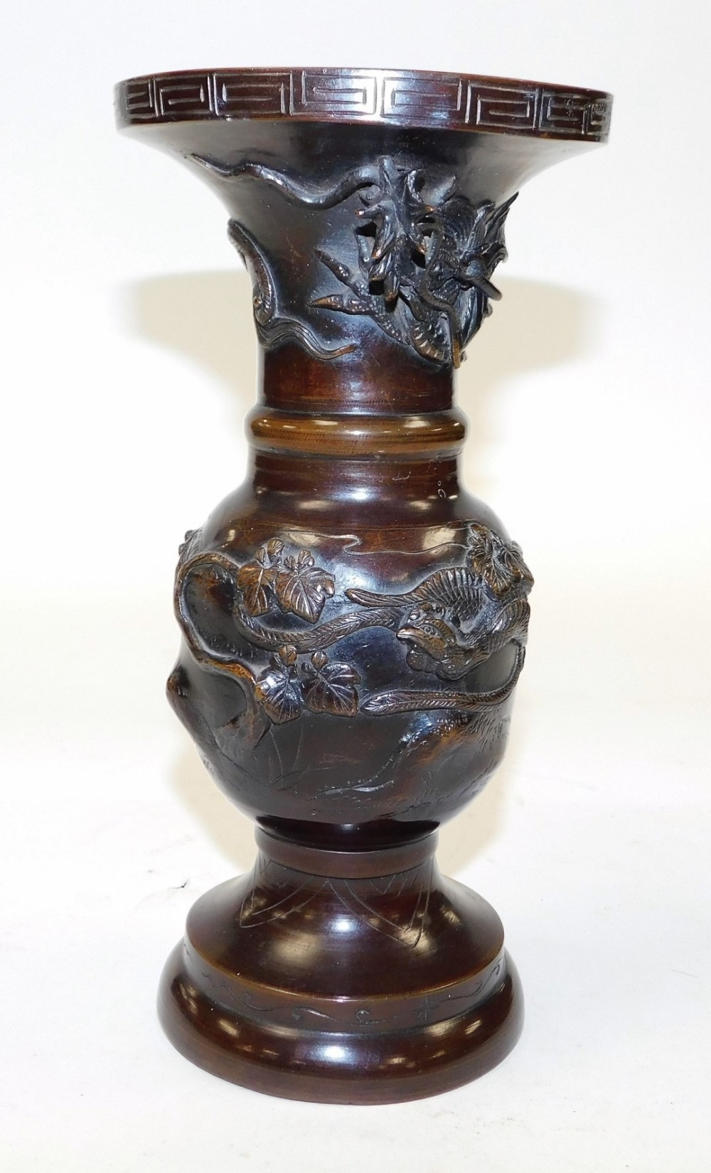 A pair of Japanese Meiji period bronze vases, cast with dragons, phoenixes and trees, 25cm high. (AF - Image 5 of 7