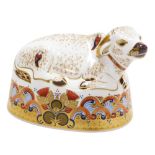 A Royal Crown Derby porcelain Water Buffalo paperweight, red printed marks and gold stopper, 12.5cm