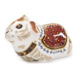 A Royal Crown Derby porcelain Guinea Pig paperweight, red printed marks and gold stopper, 12cm wide,