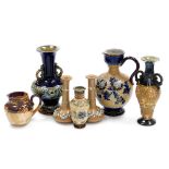 A group of Doulton Lambeth and Slater's pottery, comprising a floral decorated jug, twin handled bal