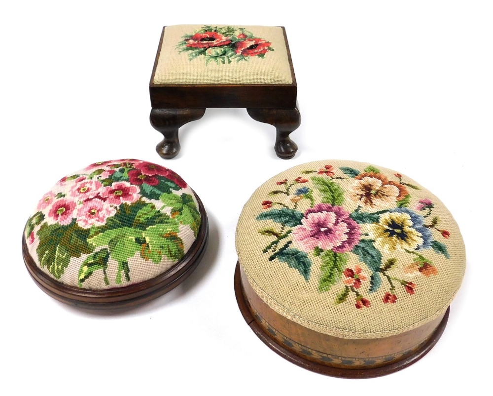 Three Victorian and later wool work upholstered foot stools, comprising a circular woolwork and chev