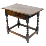 A late 18thC oak side table, the rectangular planked top with a moulded edge above a frieze drawer,