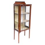 An Edwardian mahogany and marquetry display cabinet, the raised back above a single leaded glaze bow