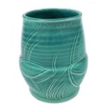 A Susie Cooper turquoise pottery vase, with incised repeating leaf decoration, signed, dated 1932, 1