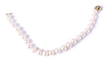 A cultured pearl single strand bracelet, set with white cultured pearls on string knotted strand, wi