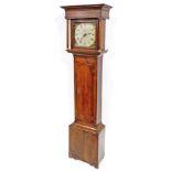 A Georgian oak longcase clock by Wood of Grantham, square dial with painted spandrels, chapter ring