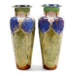 A pair of late 19thC Royal Doulton stoneware vases, of cylindrical tapering form with flared rims, d