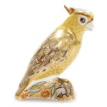A Royal Crown Derby porcelain Citron Cockatoo paperweight, red printed marks and gold stopper, 14cm