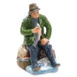 A Royal Doulton figure modelled as A Good Catch, HN2258.