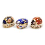 Three Royal Crown Derby porcelain bug paperweights, comprising Millennium Bug, red printed marks and