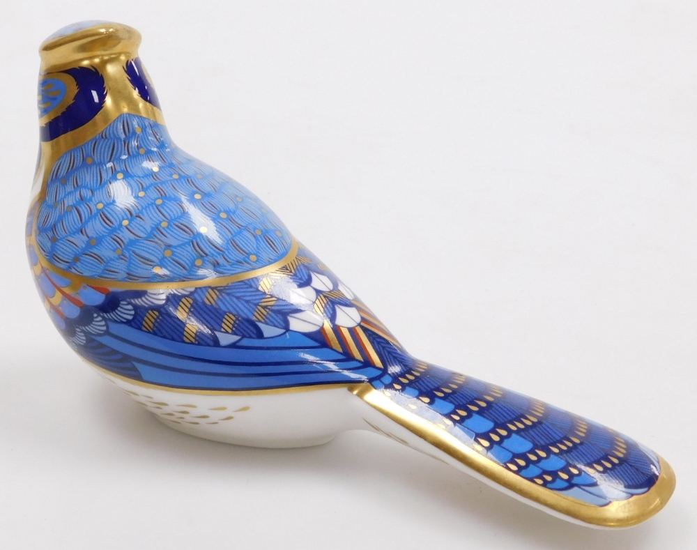 A Royal Crown Derby porcelain Blue Jay paperweight, red printed marks and gold stopper, 16cm wide. - Image 2 of 3