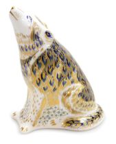 A Royal Crown Derby porcelain Wolf paperweight, red printed marks and gold stopper, 13.5cm high, box