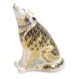 A Royal Crown Derby porcelain Wolf paperweight, red printed marks and gold stopper, 13.5cm high, box