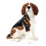 A Beswick pottery fireside dog modelled as a Beagle, number 2300, impressed marks.
