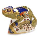 A Royal Crown Derby porcelain Chameleon paperweight, red printed marks and gold stopper, 9.5cm high,