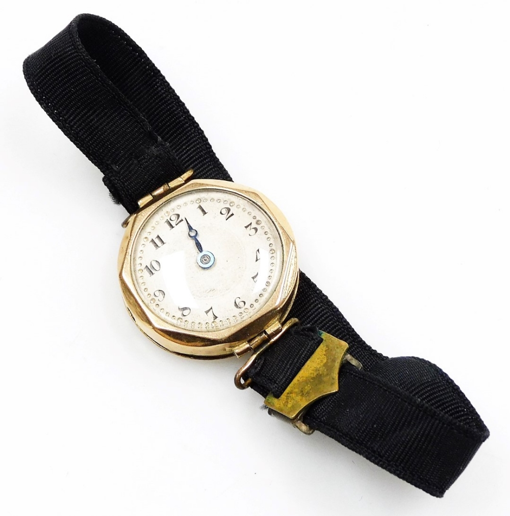 An early 20thC lady's 9ct gold cased wristwatch, circular silvered dial with engine turned decoratio - Image 2 of 3