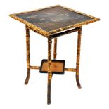 A Victorian bamboo occasional table, the rectangular top inset with a Japanned lacquered panel of fl