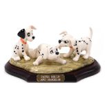 A Royal Doulton Disney's 101 Dalmatians figure group, modelled as Patch, Rolly and Freckles, limited