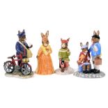 Four Royal Doulton Bunnykins figures, comprising Evacuees, DB373, Romeo, Juliet, and Postman, DB377,
