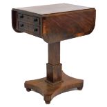 A Regency mahogany and rosewood cross banded drop leaf work table, with two frieze drawers raised on