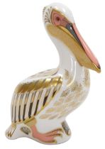 A Royal Crown Derby porcelain White Pelican paperweight, limited edition number 2706/5000, red print