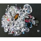 A group of unmounted mixed gemstones, to include sapphires, rubies, emeralds, and Cubic Zirconia, ap