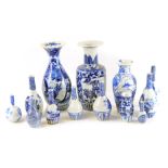 A group of Japanese and Chinese blue and white vases. (a quantity)
