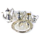 A Victorian electroplate four piece tea set, with heavy scroll detail and acorn finials, comprising