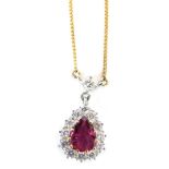 An 18ct gold ruby and diamond pendant and chain, the pendant of tear drop design, set with central p