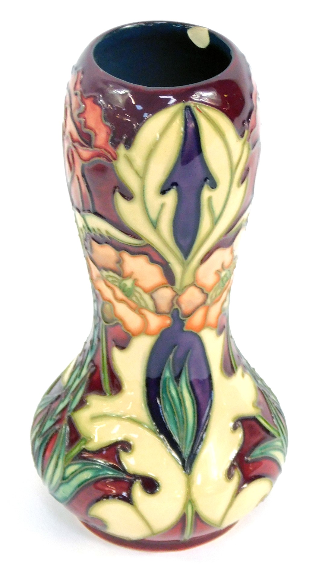 A Moorcroft Pottery vase decorated with flowers, against a cream ground, circa 2000, painted and imp